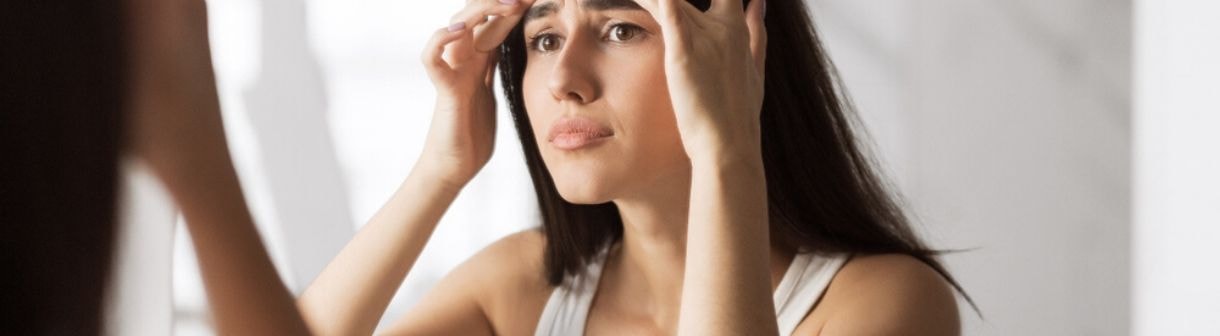 Manchas de espinhas: entenda o que são